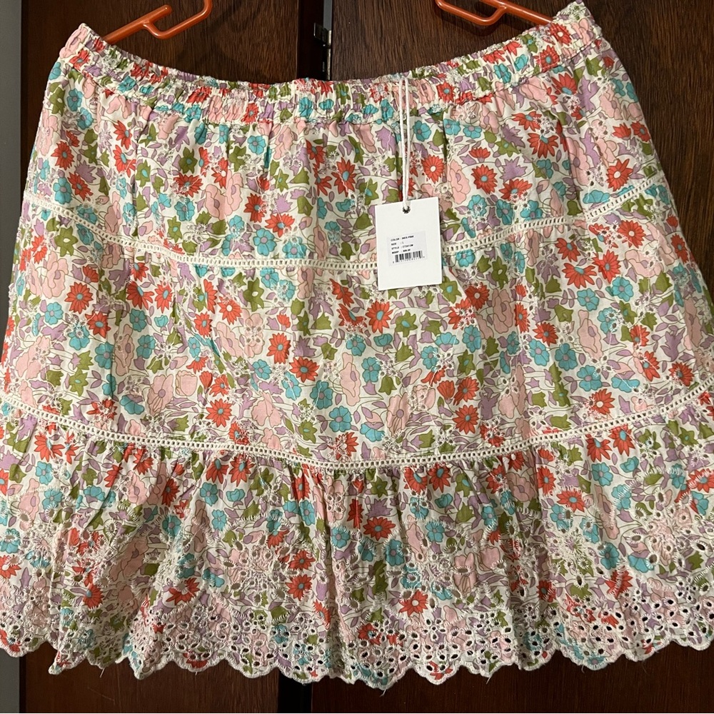 Floral eyelet mini skirt